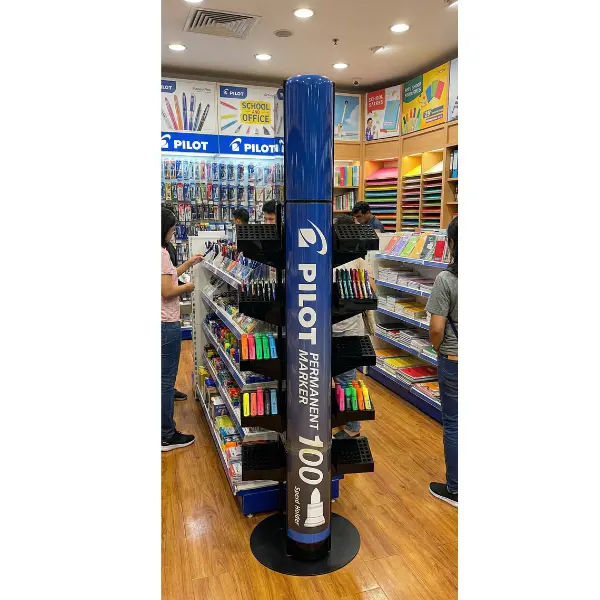 Custom acrylic floor display stand for Pilot Pen featuring high-gloss thermoformed body and weighted metal base for stability